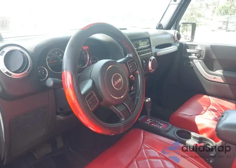 2012 Jeep Wrangler Unlimited Sahara z USA, uszkodzony, nr VIN 1C4BJWEG2CL243519